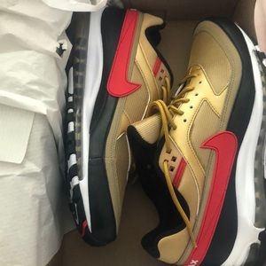 Brand new, never worn gold and red Nike Air Max